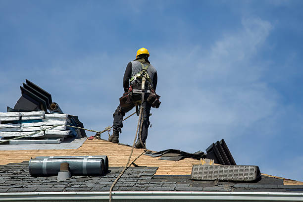 Professional Roofing technician working in Reed City, MI